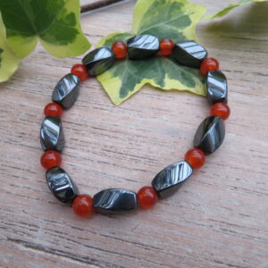 Zwart/oranje armband